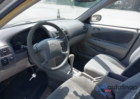 2001 Toyota Corolla Le из США, поврежденный, VIN 2T1BR12E71C491249